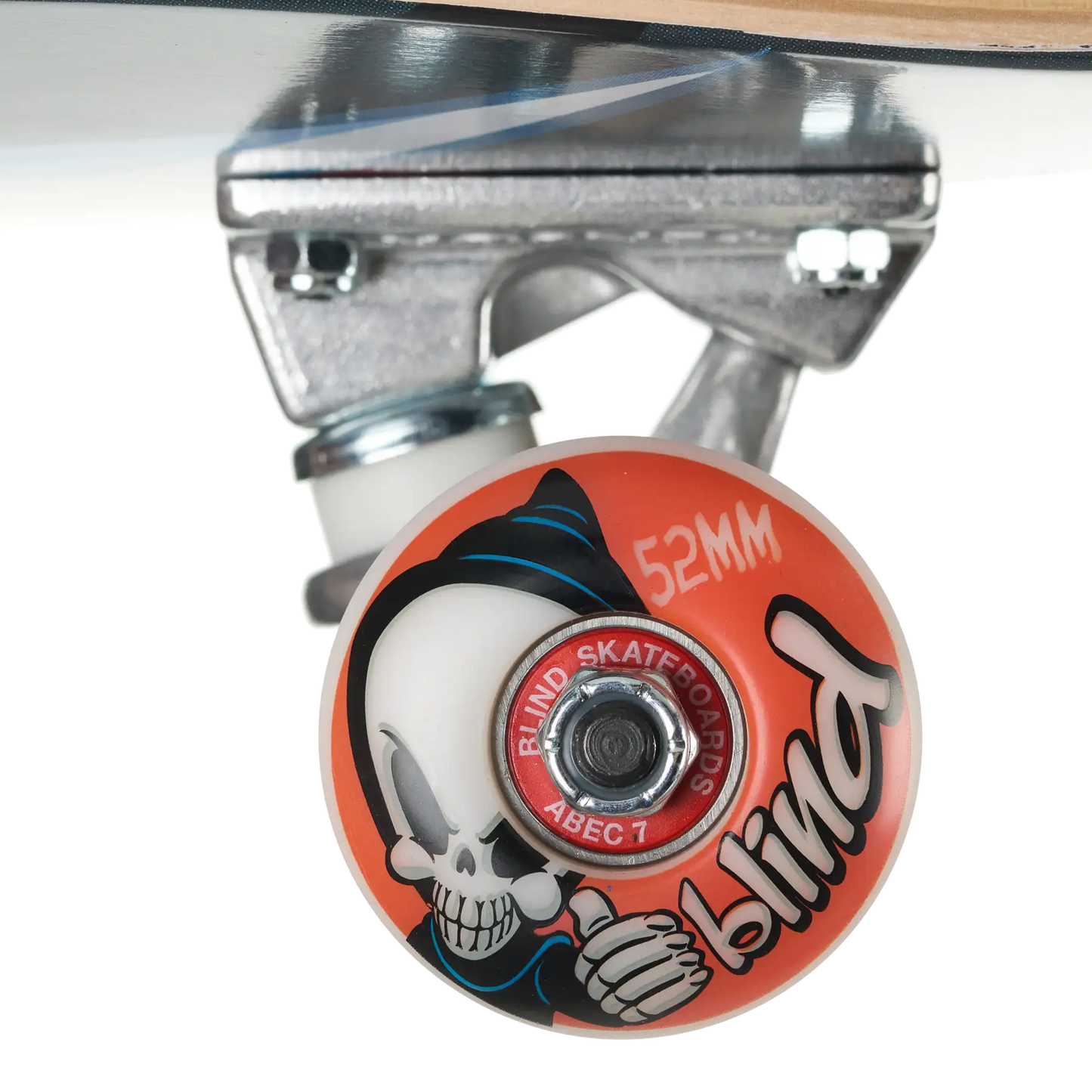 Close-up of a skateboard wheel and truck assembly on a white background. The wheel is orange with a cartoon skull graphic, black script text reading 'blind', and a red center ring that says 'RUMSK SKATE CO.