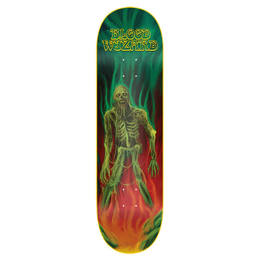 Skateboard deck with a skeleton design and 'Blood Wizard' branding on a green and red background.
