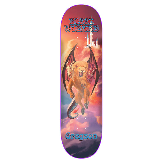 Skateboard deck with a fantasy design featuring a dragon and castle, branded 'Blood Wizard' and 'Gregson'.