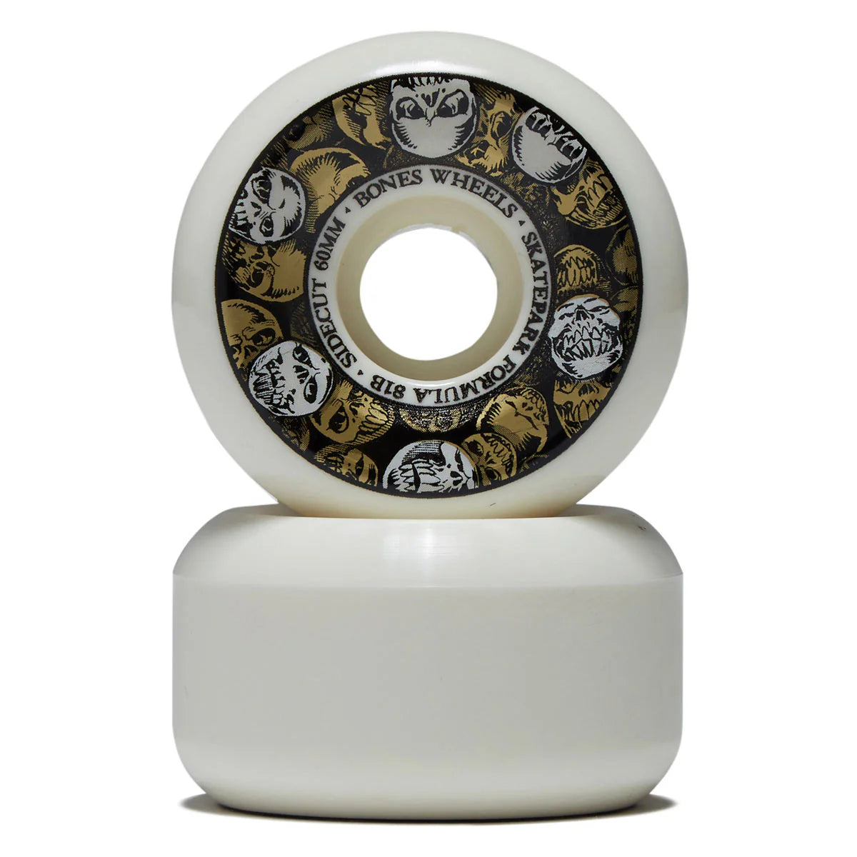 Skateboard wheel with white rim and black and gold patterned center on a white background