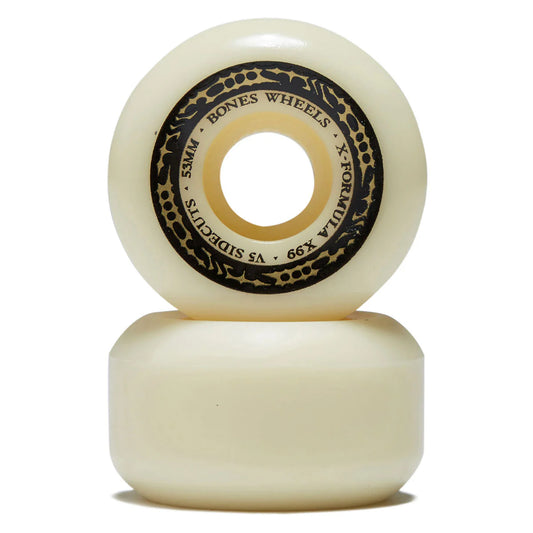 Two cream-colored skateboard wheels with black text on a white background