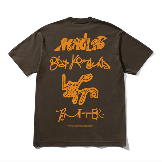 Brown t-shirt with yellow graphic text on a white background