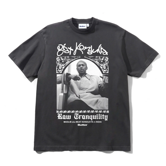 Black t-shirt with graphic design and text on a white background