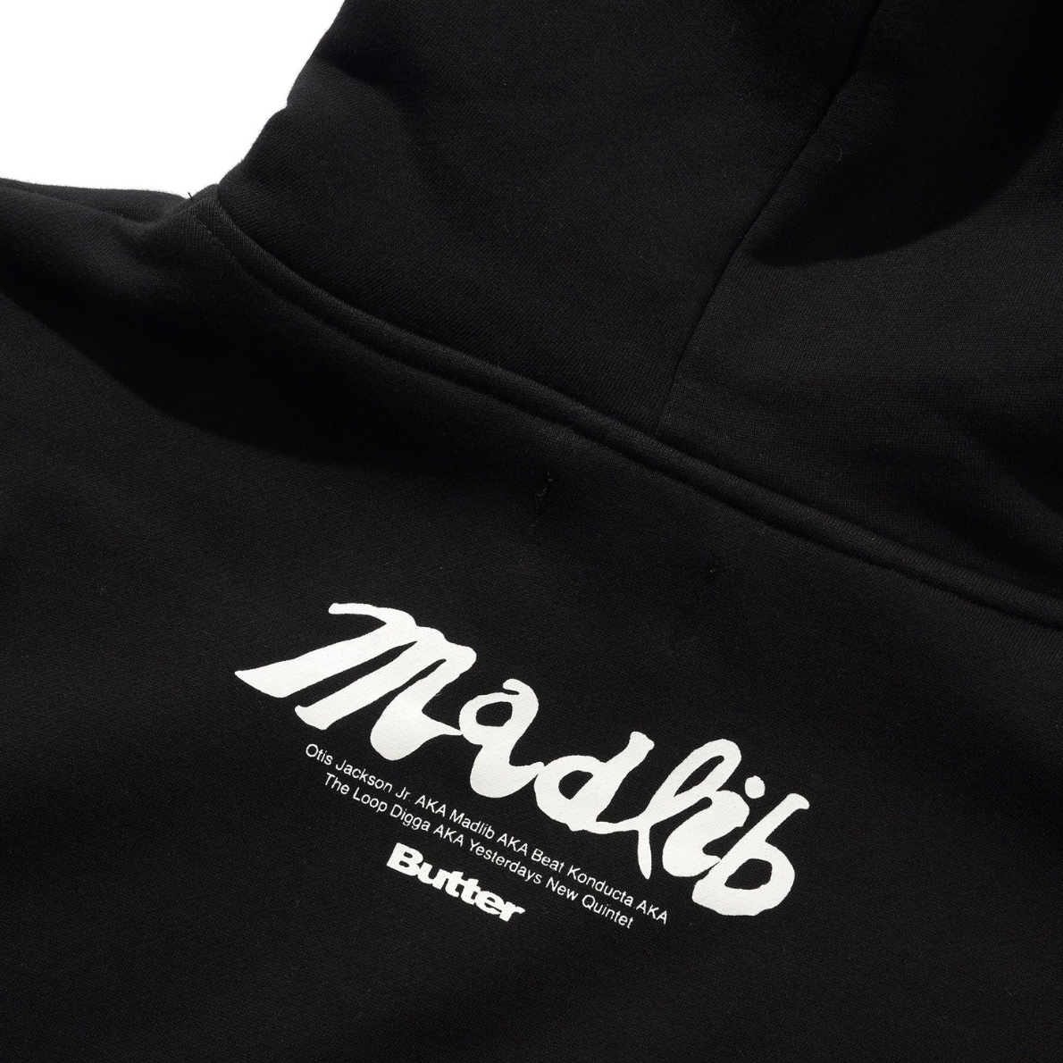 Black hoodie with white 'Madlib' logo and text on a white background