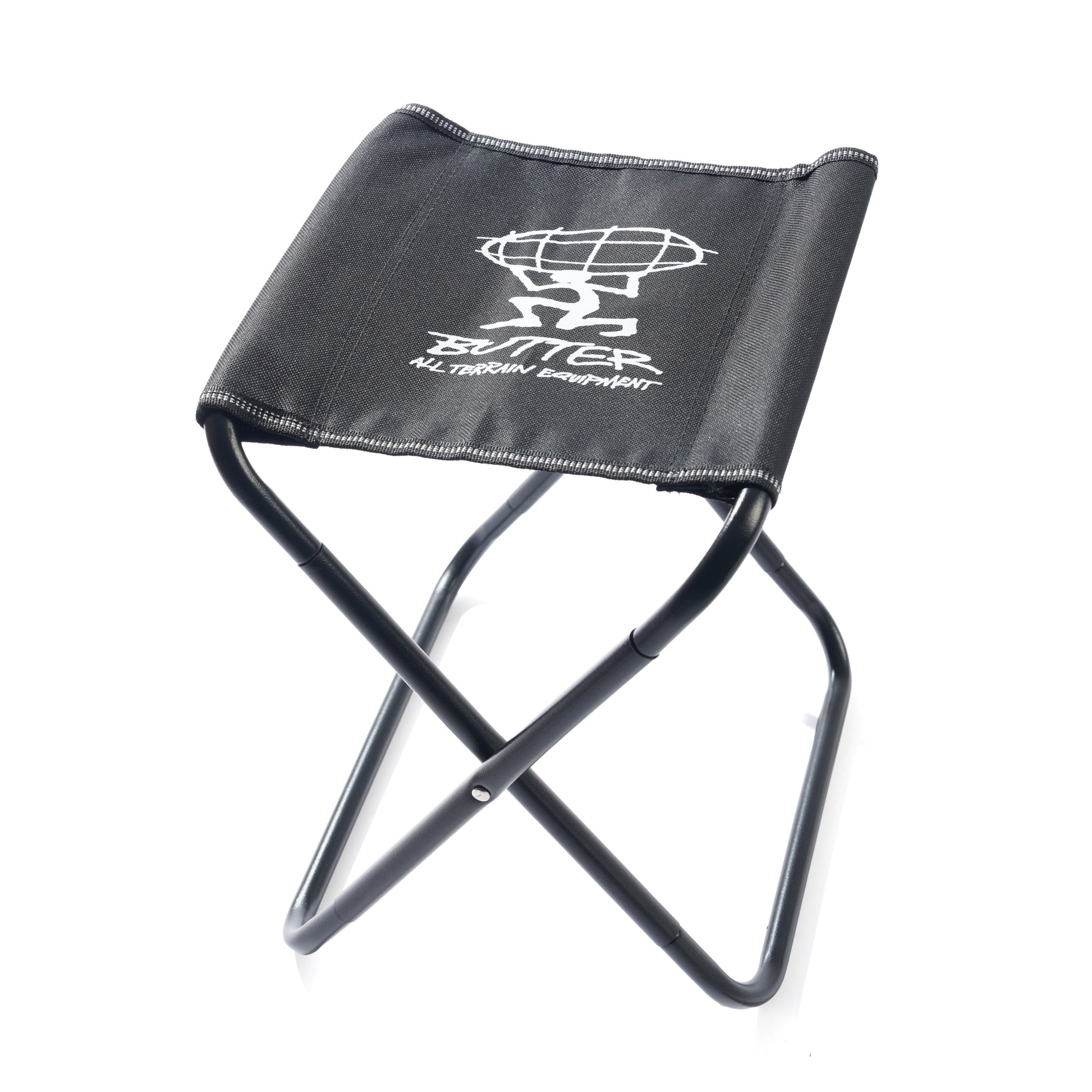 Black folding stool with 'Butter' logo on a white background
