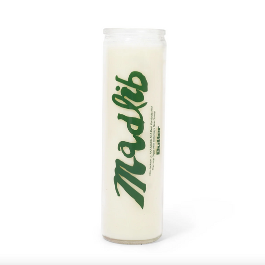 Candle with 'Madlib' branding on a white background