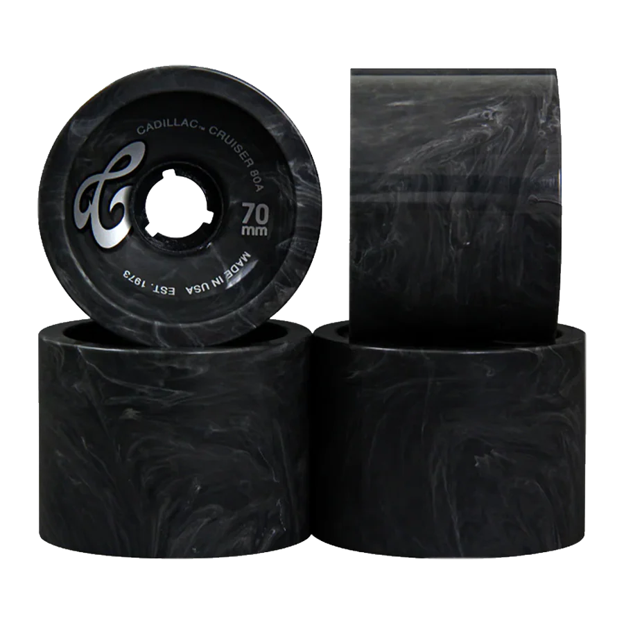 Four black skateboard wheels with visible branding on a white background