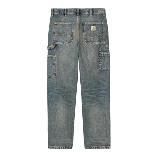 Blue denim jeans on a white background