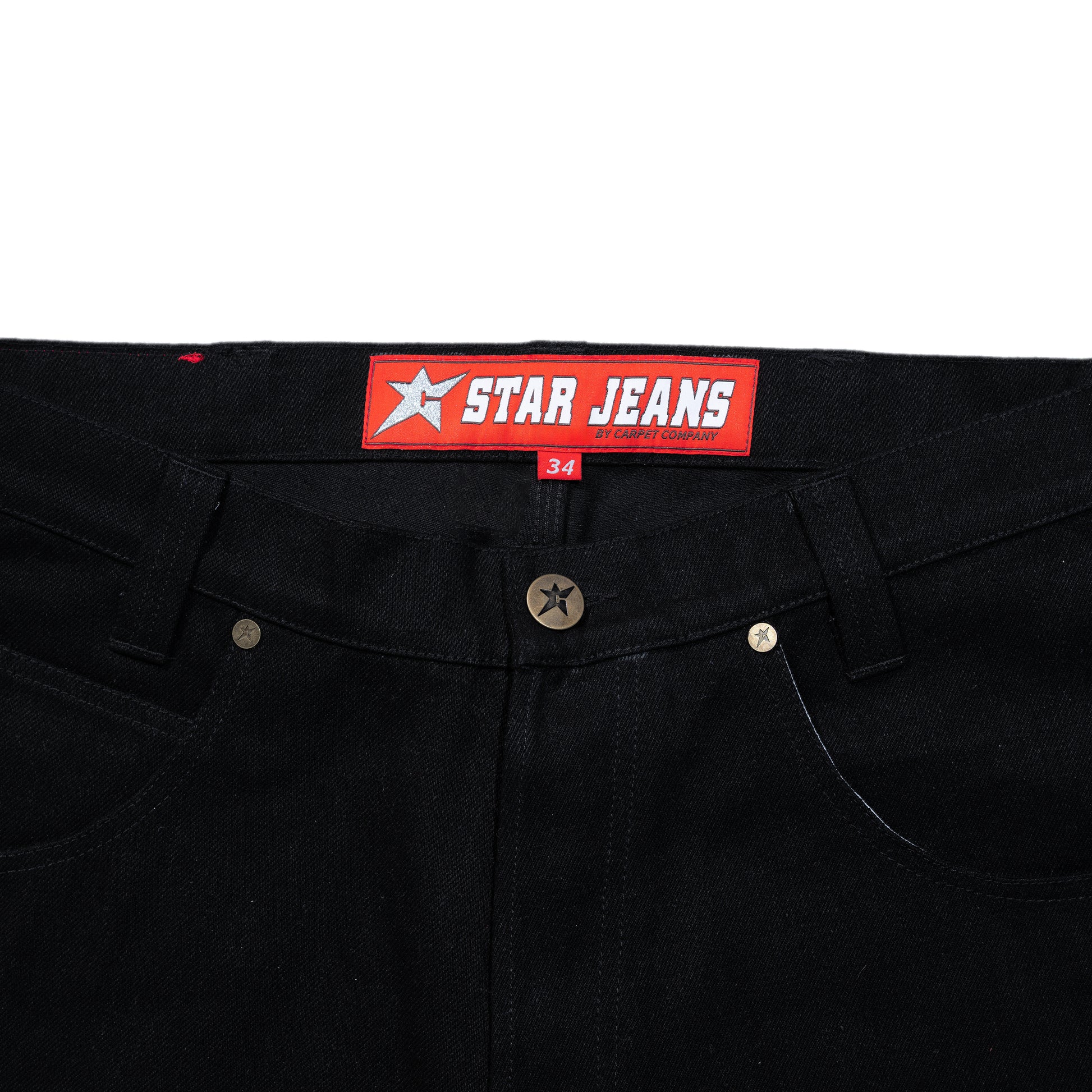 Black jeans with a red 'Star Jeans' label on a white background