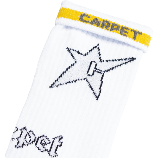 White sock with black star design and yellow band with 'CARPET' text on a white background