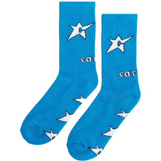 Blue socks with white star patterns and 'carpet' text on a white background