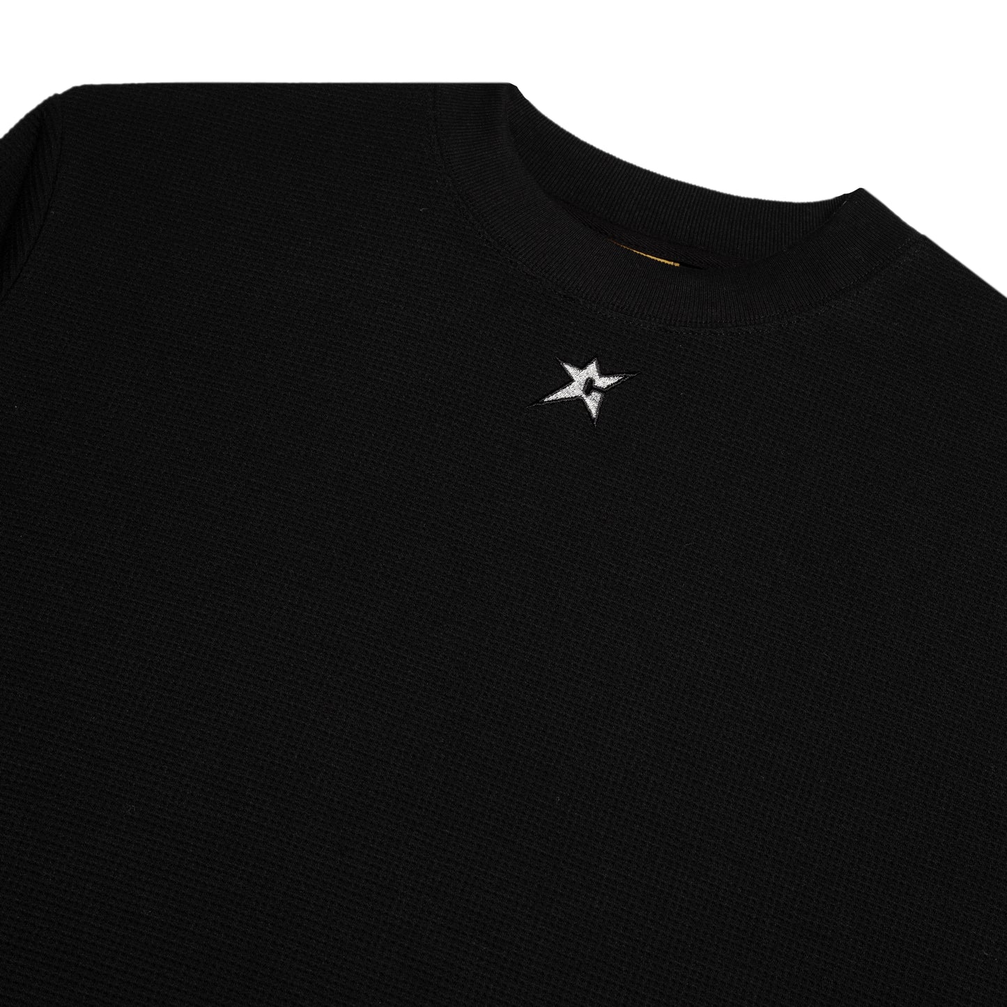 Black t-shirt with a white star logo on a white background