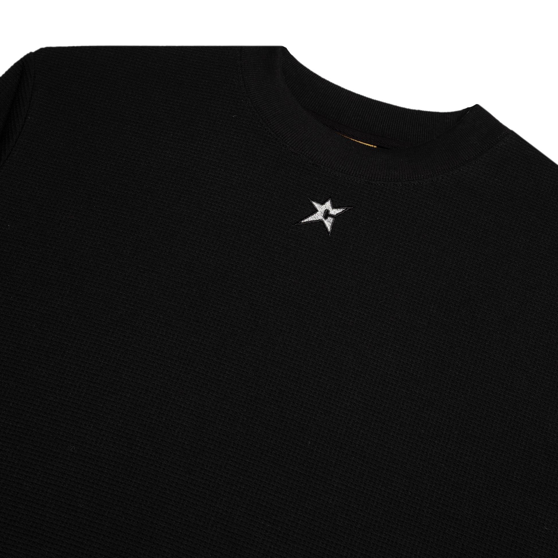 Black t-shirt with a white star logo on a white background