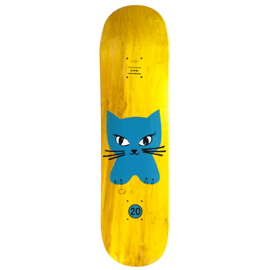 Skateboard deck with a blue cat face design on a yellow background
