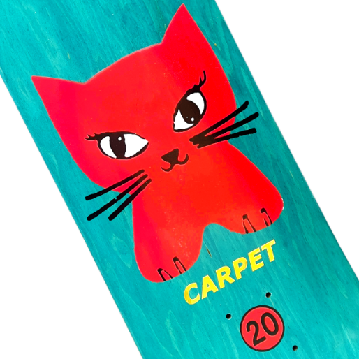 Skateboard deck with a red cat illustration and 'Carpet' text on a teal background