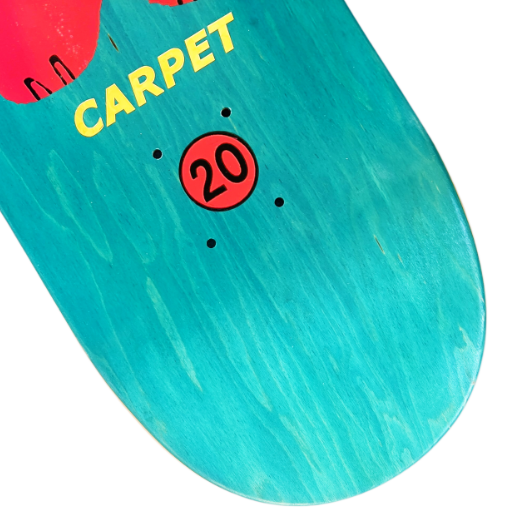 Teal skateboard deck with 'CARPET' and number '20' printed on it