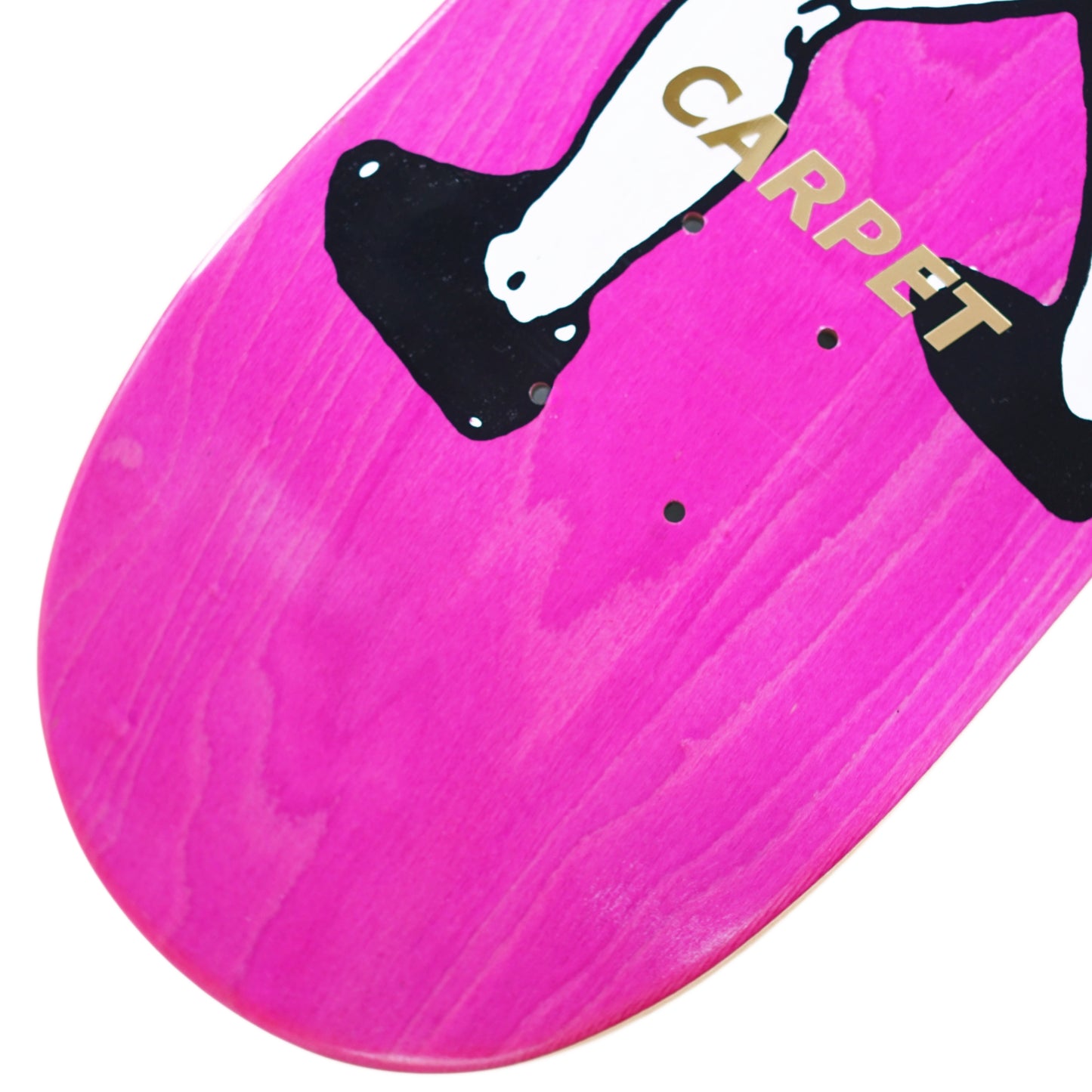 Pink skateboard deck with a black and white graphic and 'CARPET' text on a white background