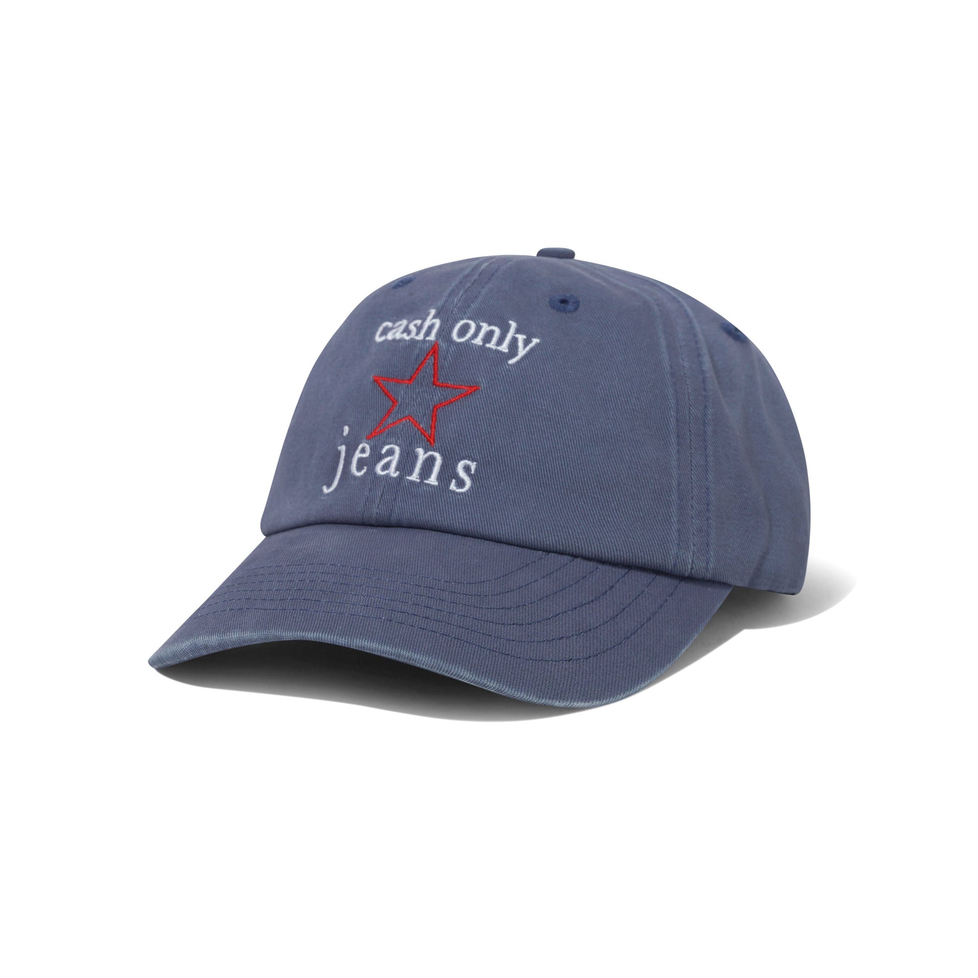 A blue denim baseball cap with embroidered text reading 'cash only jeans' in white, and a red star outline on the front, shown on a white background.