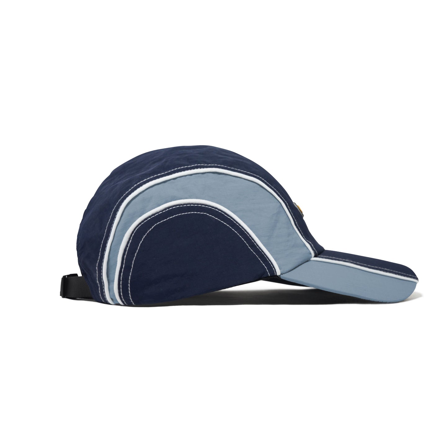 Navy and light blue visor cap on a white background