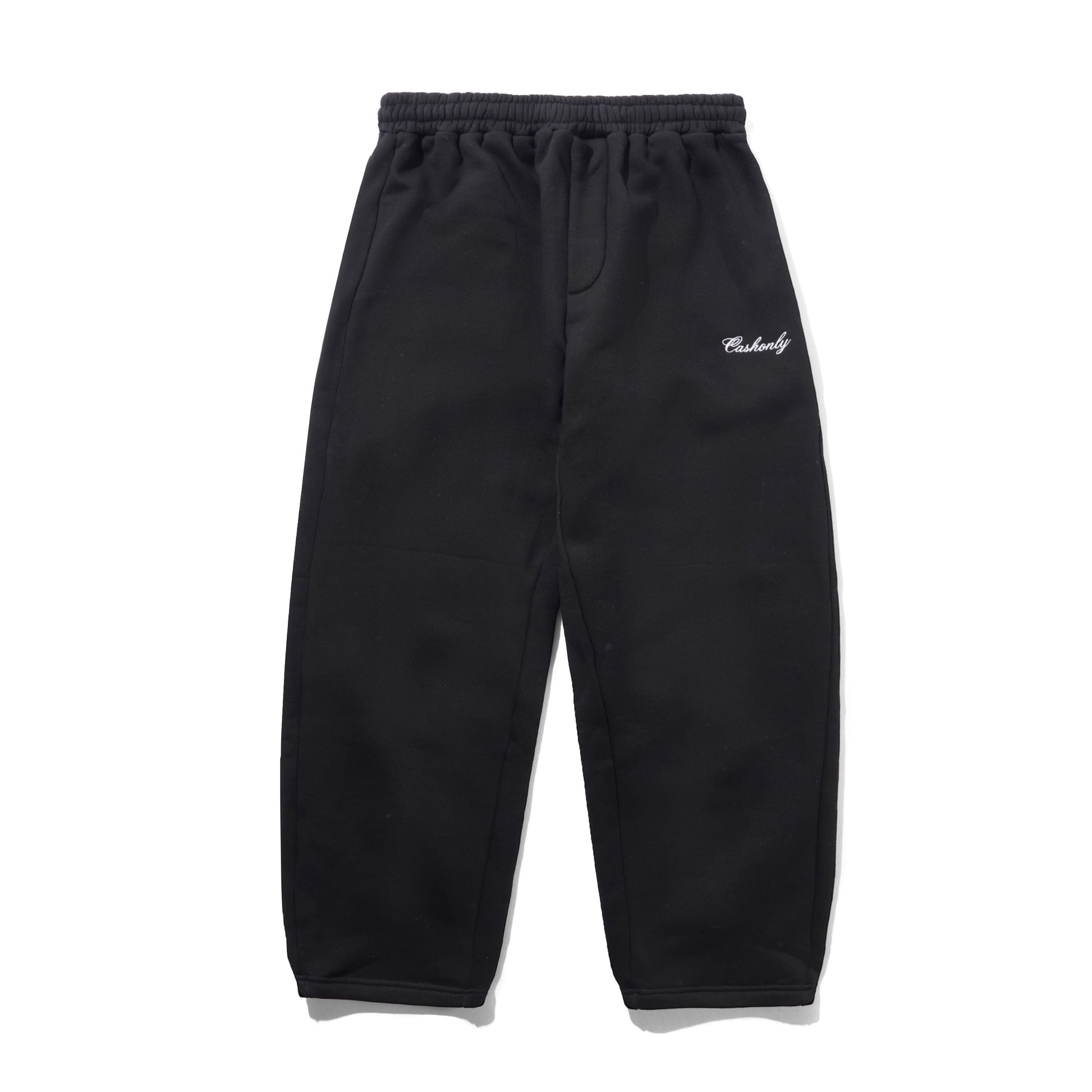 Black sweatpants with an elastic waistband, drawstring, side pockets, and a small white embroidered script logo on the left hip, shown flat on a white background.