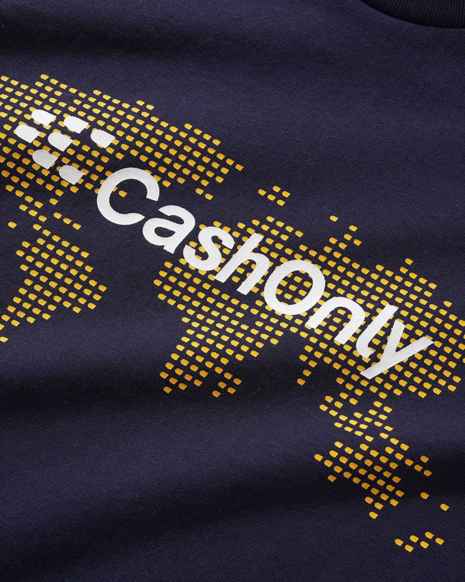 Navy blue fabric with 'CashOnly' text in white and yellow pattern