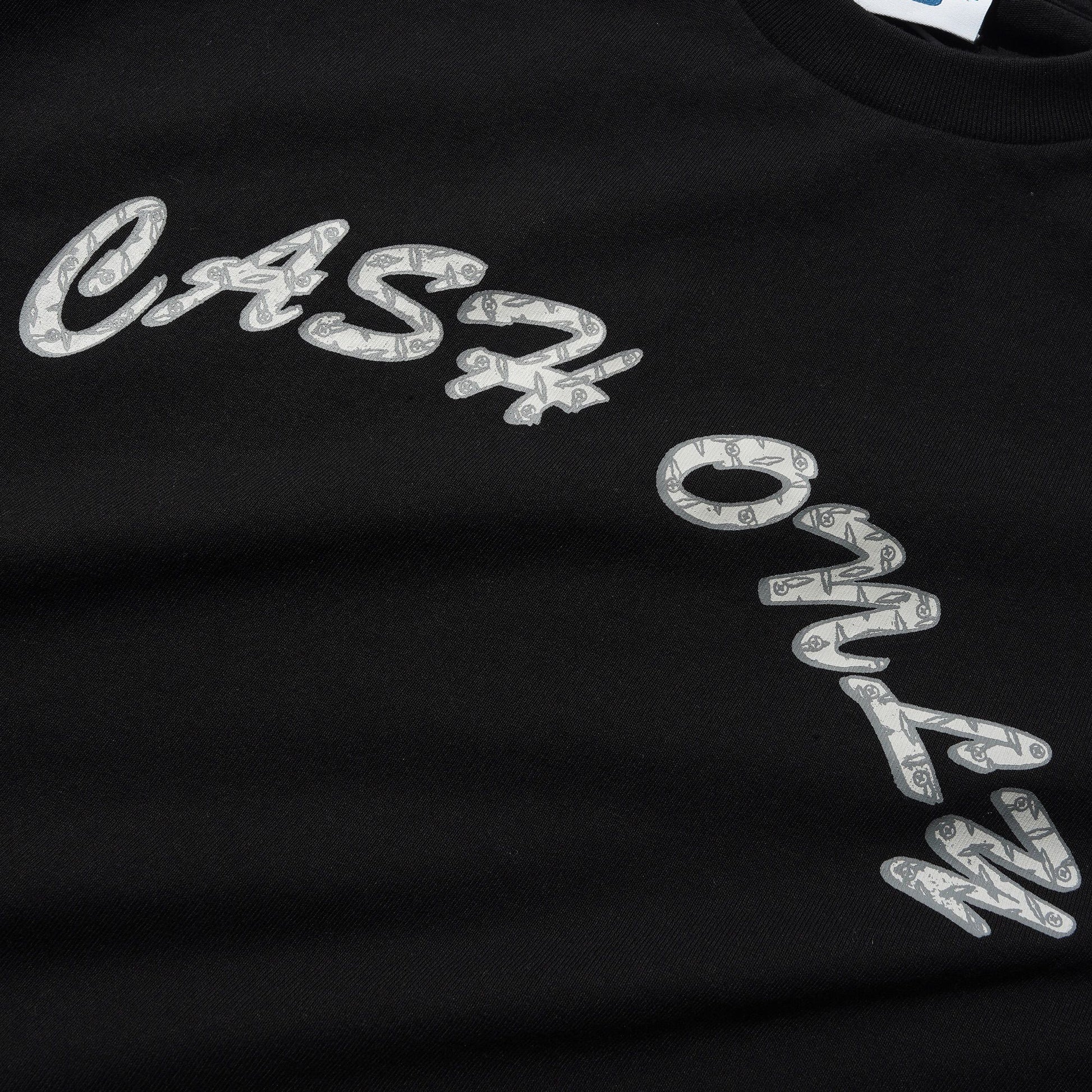 Black t-shirt with 'Cash Only' text design on a plain background