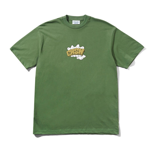 An olive green short-sleeve t-shirt with a cartoon graphic on the chest that reads 'CRASH' in yellow with white outlines, displayed flat against a white background.