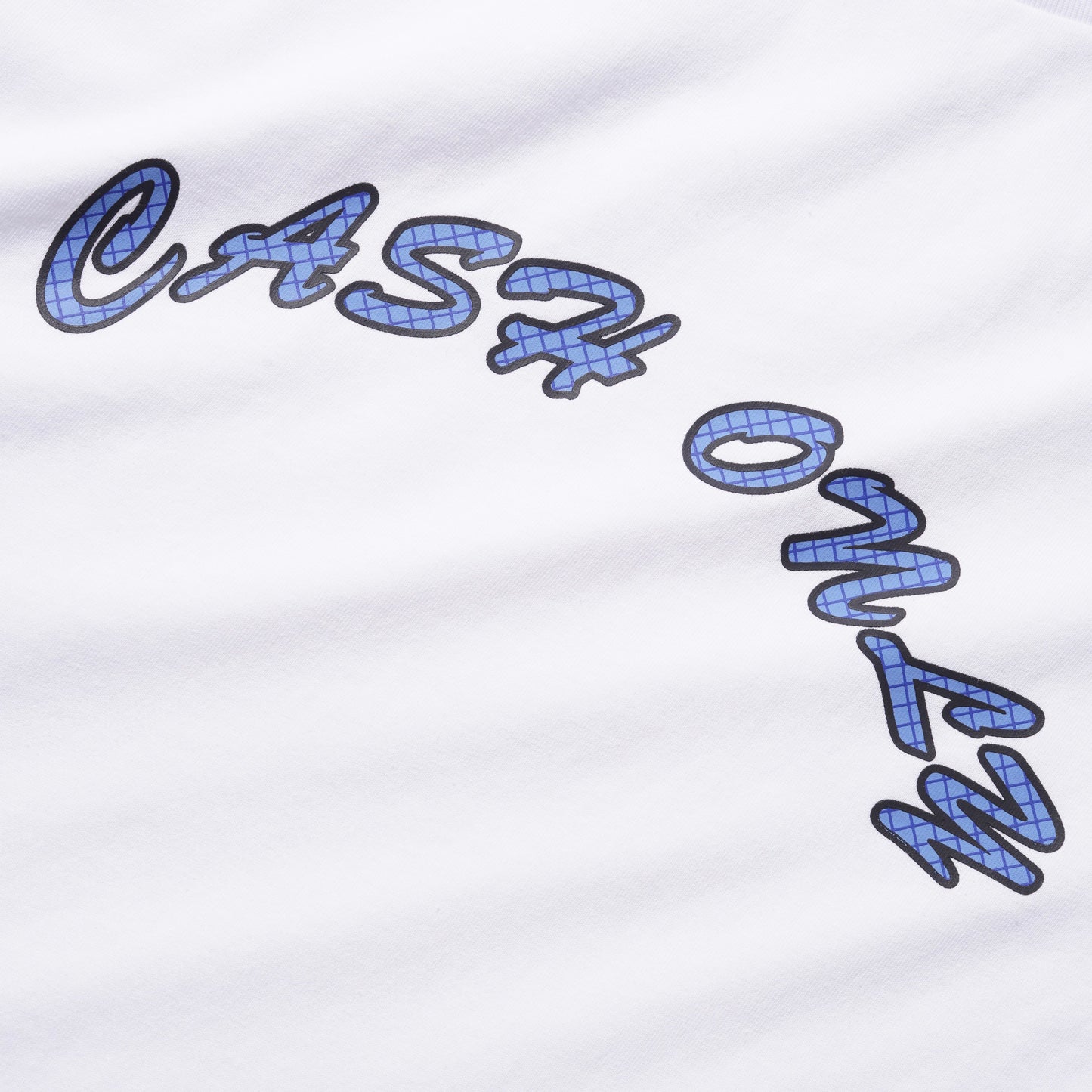 Close-up of a white T-shirt with large stylized blue and black 'CASH OWL' lettering across the chest.