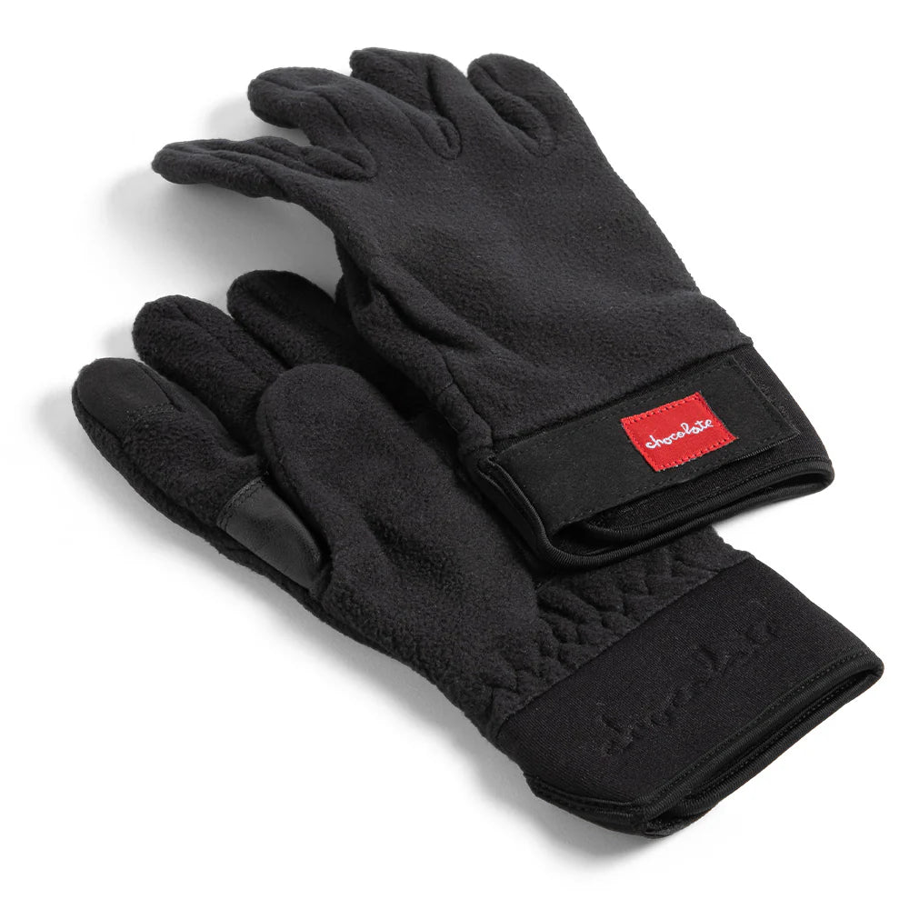 Black fleece gloves with a red label on a white background