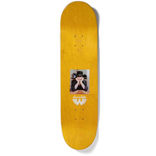 Yellow skateboard deck with a printed design on a white background