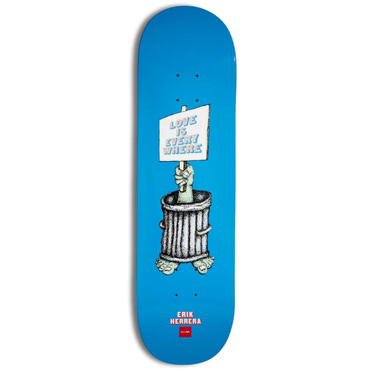 A skateboard deck with a bright blue background, featuring a graphic of a hand holding a sign that reads 'LOVE IS EVERYWHERE' above a trash can, with the text 'ERIK HERRERA' and a small red box logo near the bottom.