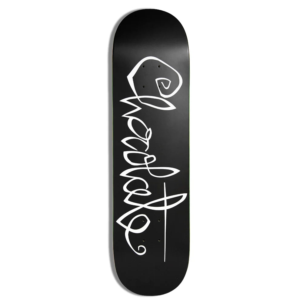 A black skateboard deck with a white stylized script graphic running vertically down the center, shown against a plain white background.