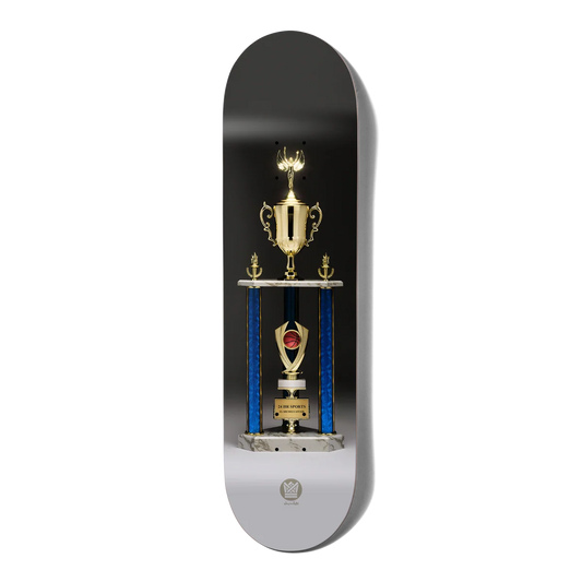 A skateboard deck featuring a printed graphic of a trophy on a black background with blue and silver vertical bars, shown on a plain white background.