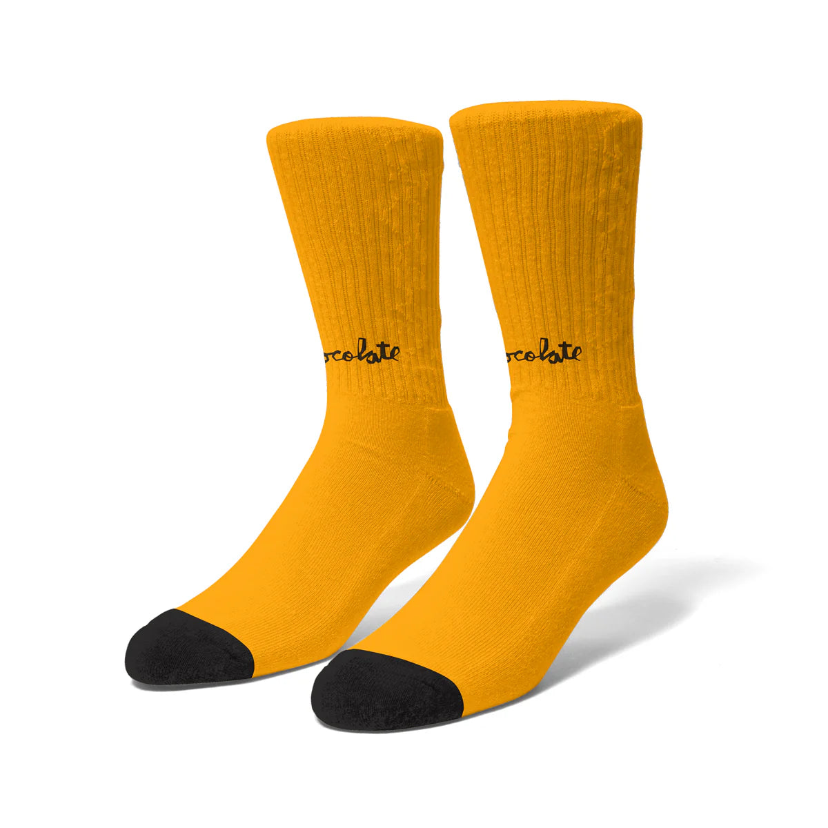 Pair of yellow socks with black toes and heels on a white background