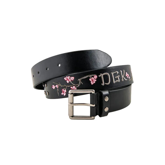 Black belt with floral embroidery and silver buckle on a white background
