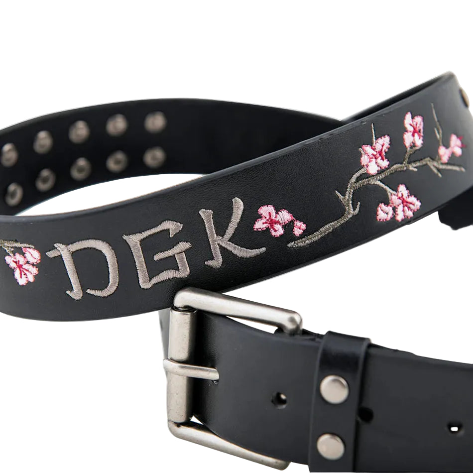Black belt with floral embroidery and 'DGK' branding on a light gray background