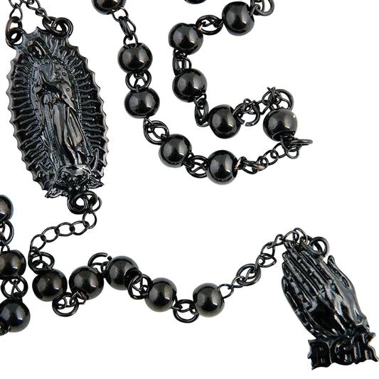 Black rosary with black beads and religious symbols on a white background