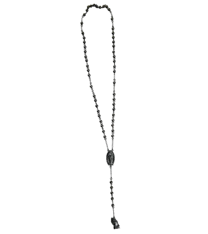 Long beaded necklace with a pendant on a white background