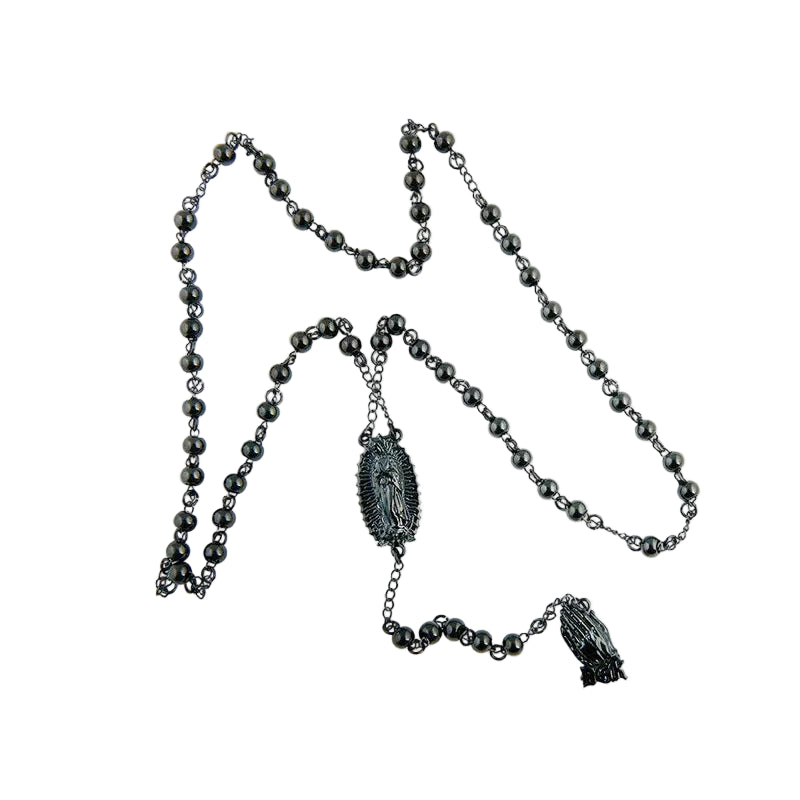 Black beaded necklace with decorative elements on a white background