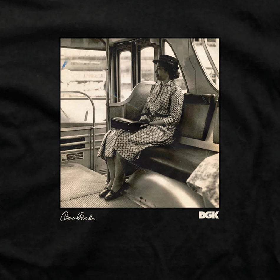 Vintage-style black and white photo of a woman sitting on a train with DGK branding.