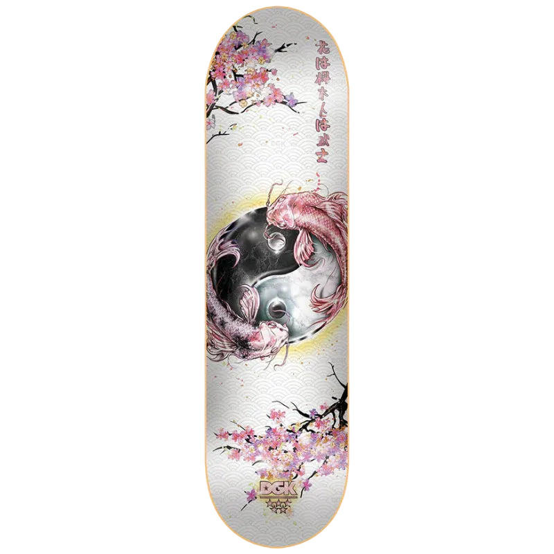 Skateboard deck with yin yang design and cherry blossoms on a white background
