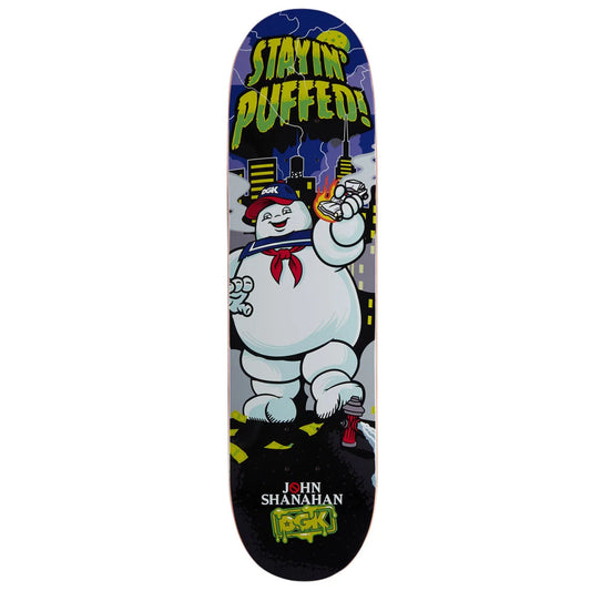 A Ghostbusters skateboard deck featuring the Stay Puft character and the text 'STAYING PUFFED!' and 'JOHN SHANAHAN ROCKS!' on a white background.