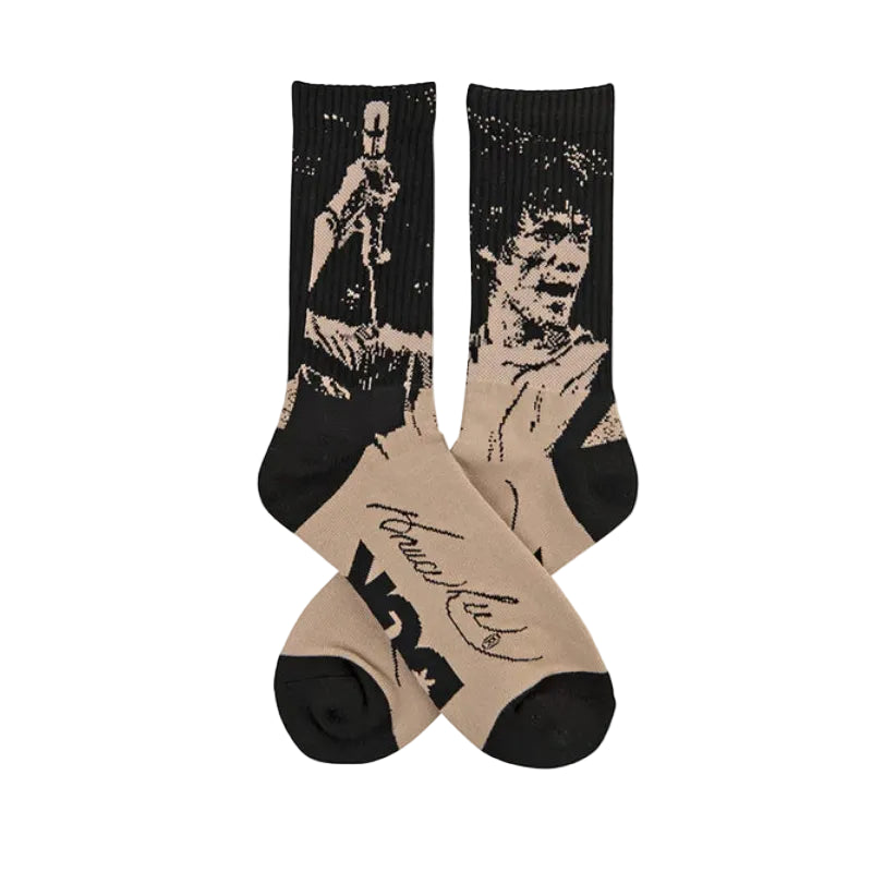 Two socks with graphic designs on a white background