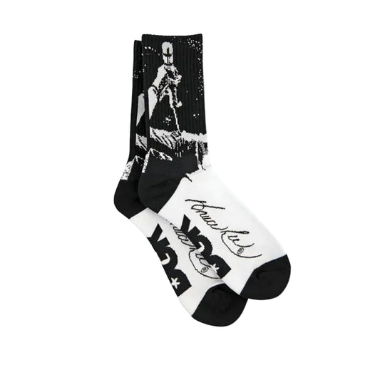 Black and white socks with graphic designs on a white background