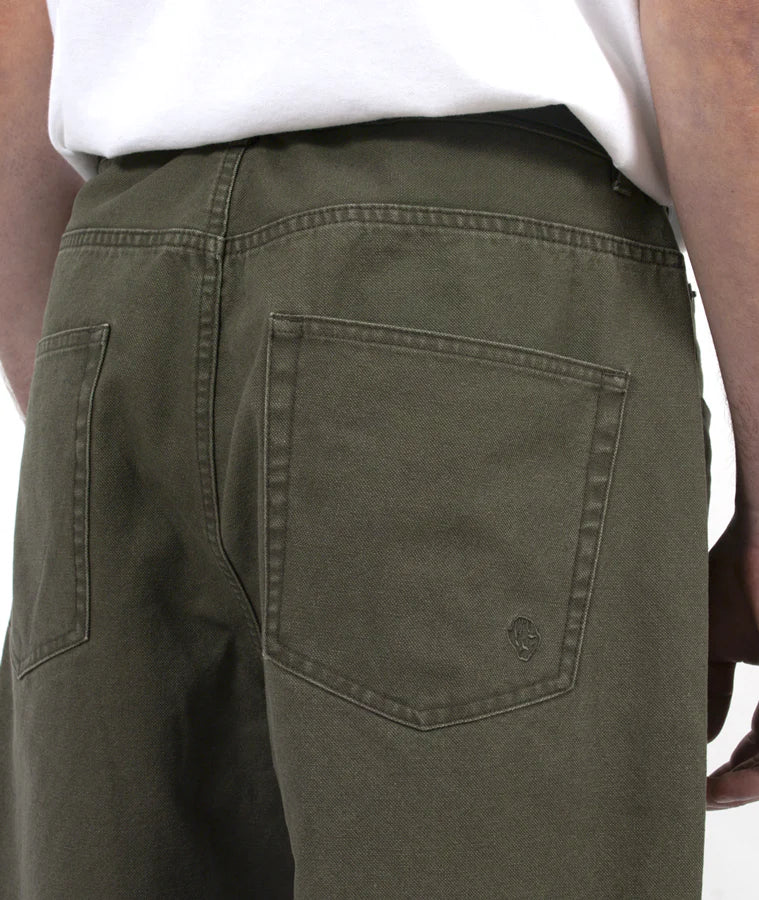 Green pants with a pocket detail on a white background