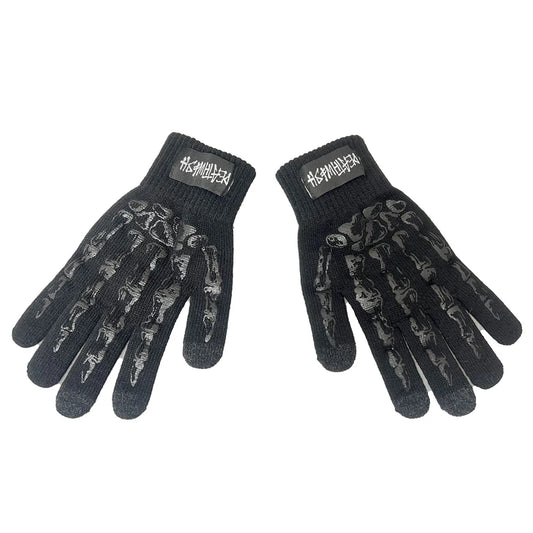 Pair of black gloves with camouflage pattern on a white background