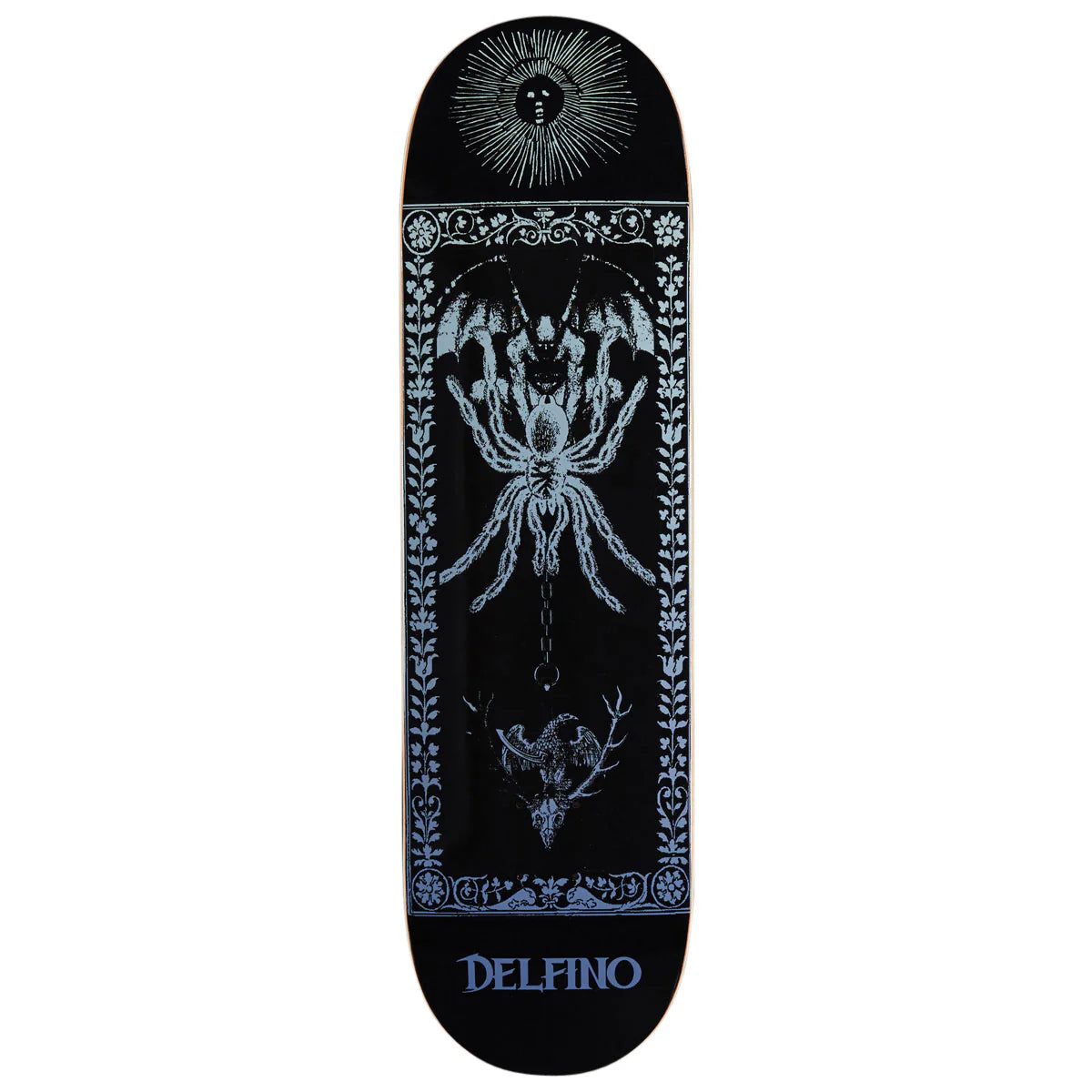 A black skateboard deck featuring a detailed light blue and white graphic design with a large spider, a sun face, and the brand name 'DELFINO' printed in blue at the bottom.