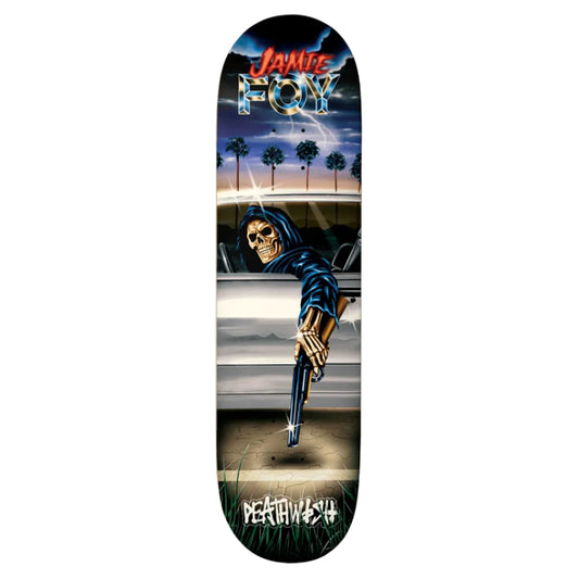 Skateboard deck with a graphic design of a skeleton holding a gun, palm trees, and 'Jamie Foxx' branding.