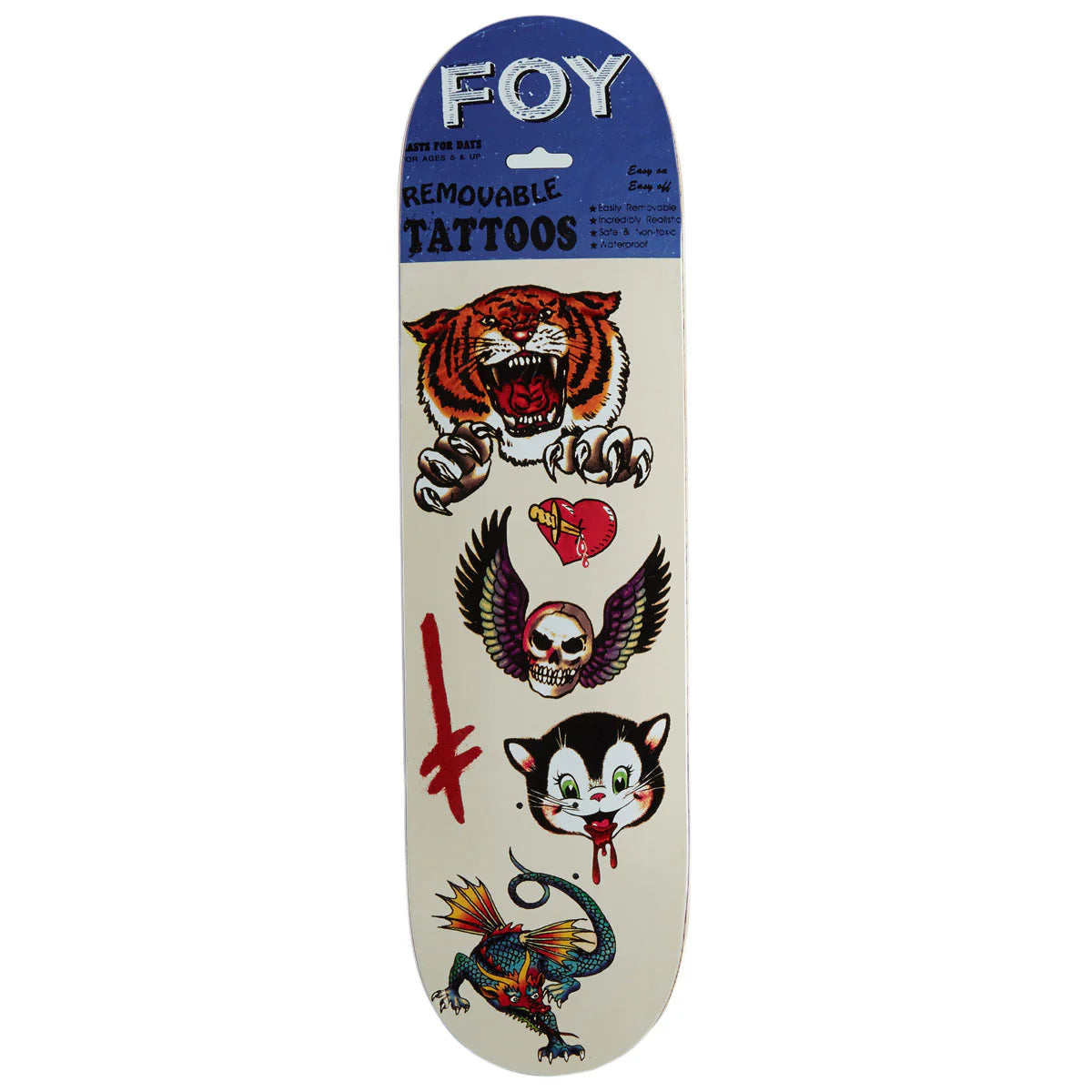 A packaged Foy removable tattoo kit featuring four traditional tattoo designs: a tiger, a skull with a heart, a black-and-white cat with blood, and a dragon, on an off-white board with a blue header card.