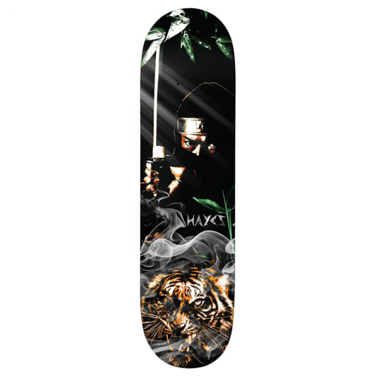 Skateboard deck with a ninja and tiger design on a black background